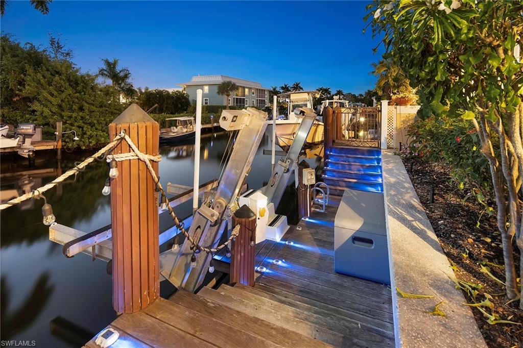 1160 Clam Court, Unit 3 Naples, FL 34102 - Photo 46 of 50 a view of a balcony with chairs