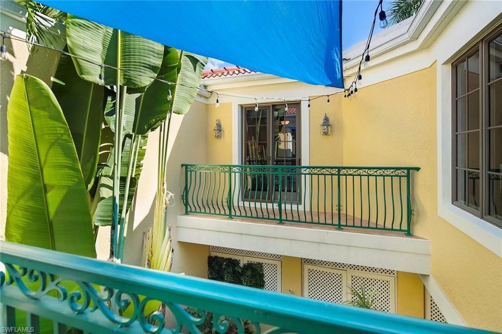 1160 Clam Court, Unit 3 Naples, FL 34102 - Photo 49 of 50 a view of a house with a window
