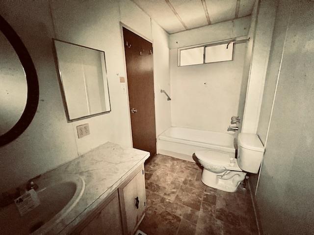 5208 9th Street Keyes, CA 95328 - Photo 20 of 35 a bathroom with a granite countertop sink and a mirror