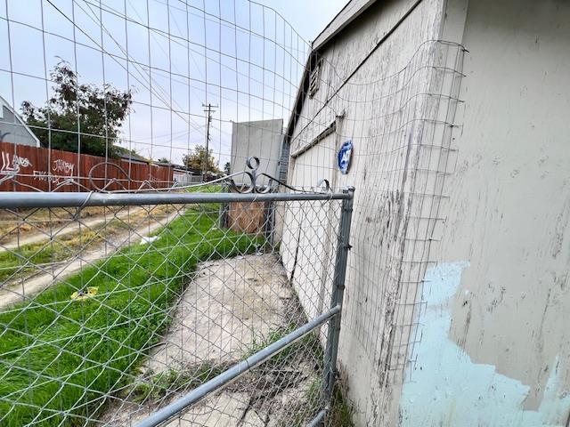 5208 9th Street Keyes, CA 95328 - Photo 23 of 35 a view of a pathway both side of building