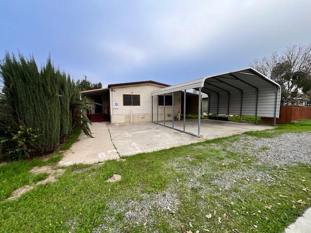 5208 9th Street Keyes, CA 95328 - Photo 3 of 35 a backyard of a house with table and chairs