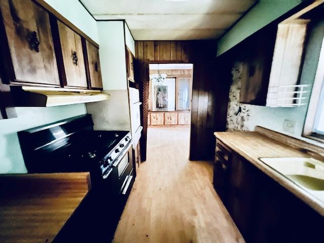 5208 9th Street Keyes, CA 95328 - Photo 4 of 35 a kitchen with stainless steel appliances granite countertop a sink stove and refrigerator