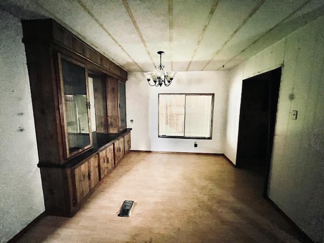 5208 9th Street Keyes, CA 95328 - Photo 10 of 35 wooden floor in an empty room with a window