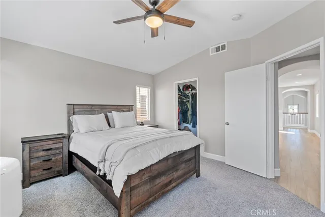 a view of a kitchen and a wooden floor