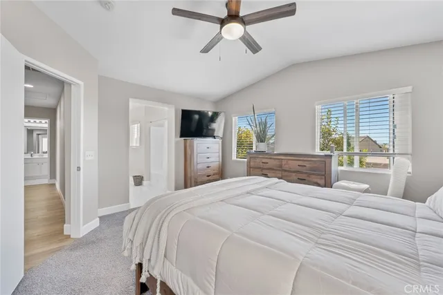 a view of dining room and kitchen with a window