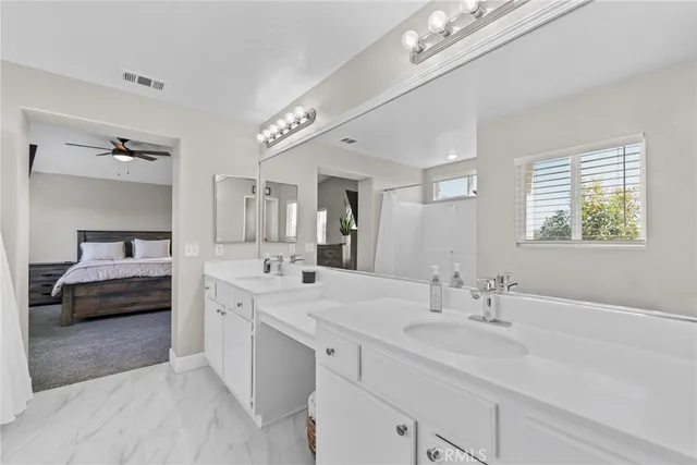 a white toilet sitting in a bathroom