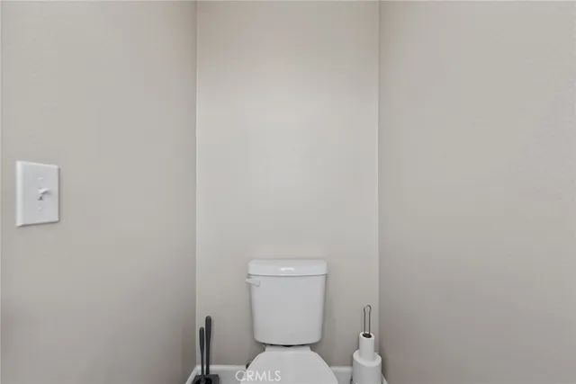 a spacious bathroom with a double vanity sink a mirror and shower