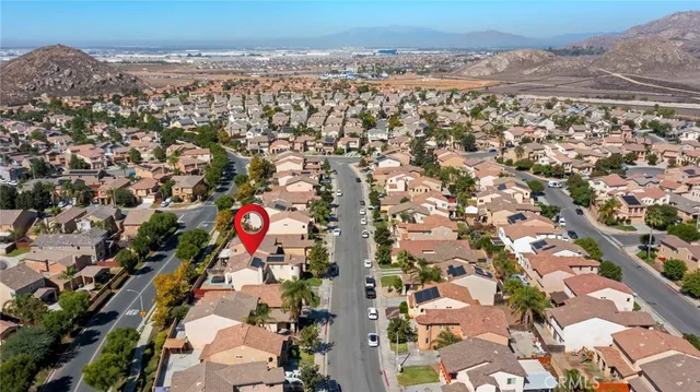 a view of hallway with wooden floor
