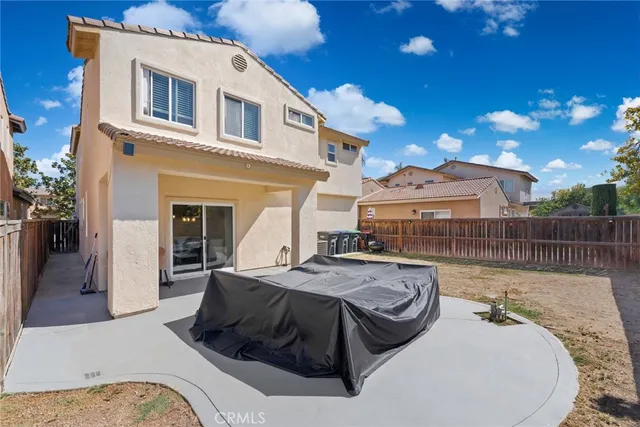 a view of a house with a patio