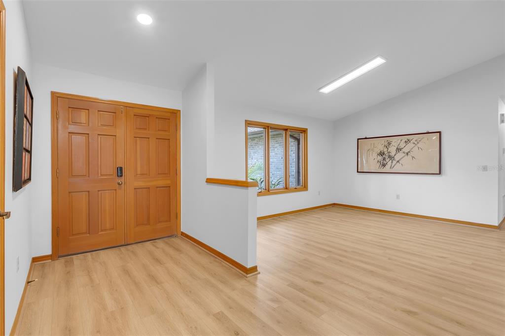 17000 Red Bird Road Winter Garden, FL 34787 - Photo 15 of 46 Dining Room and main entrance