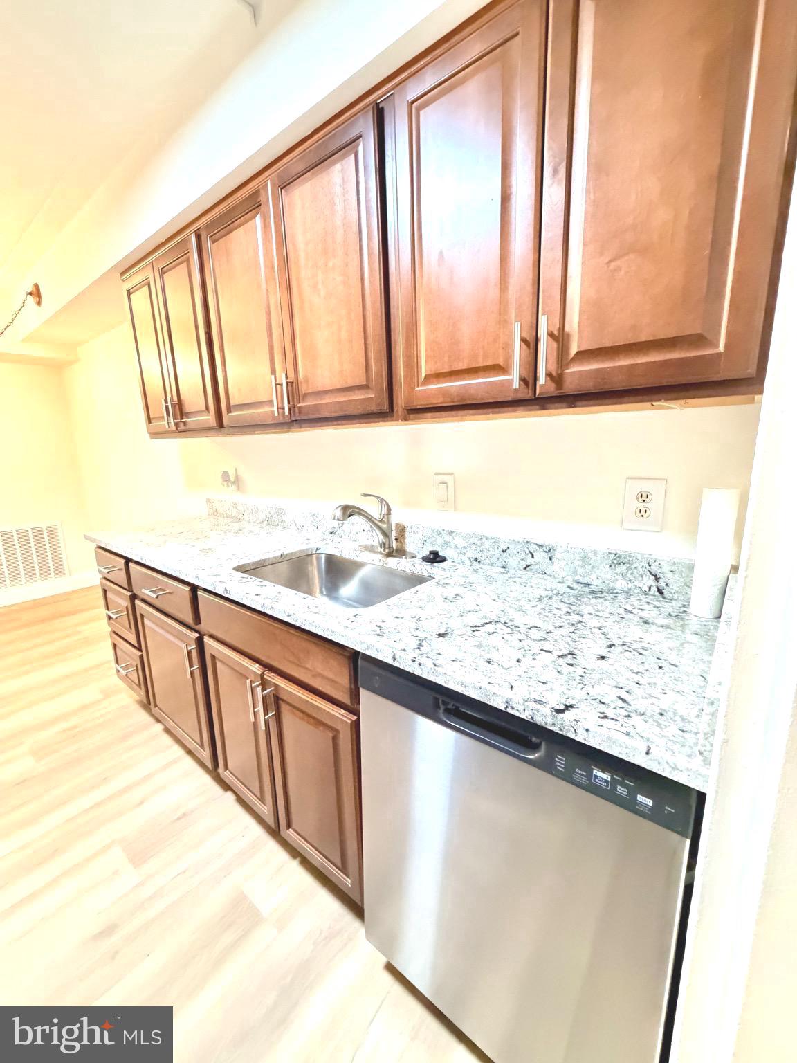 2316 Freetown Court, Unit 1B Reston, VA 20191 - Photo 5 of 36 a view of a kitchen from a window