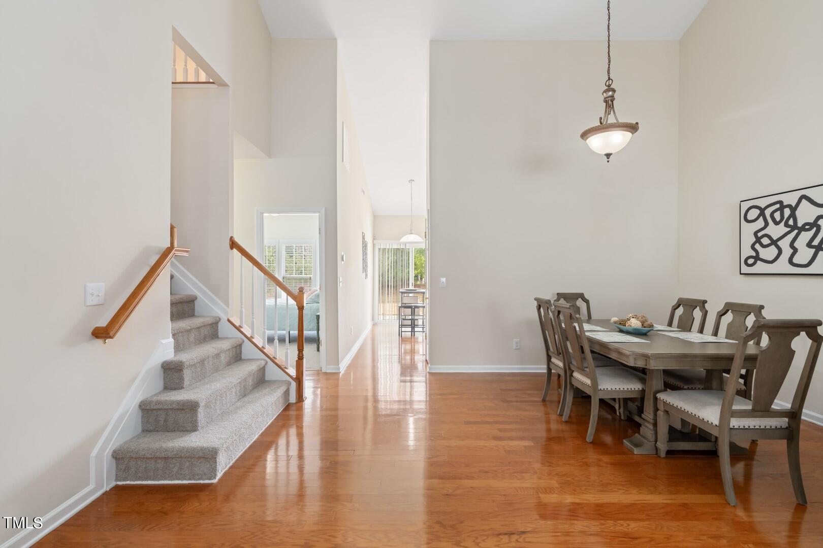 12219 Fox Valley Street Raleigh, NC 27614 - Photo 11 of 36 a view of a dining room with furniture