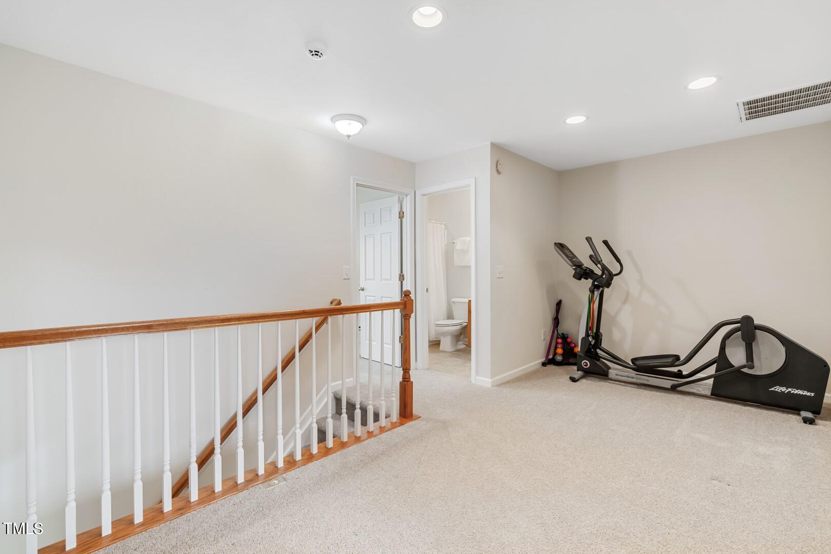 12219 Fox Valley Street Raleigh, NC 27614 - Photo 22 of 36 a view of a room with gym equipment