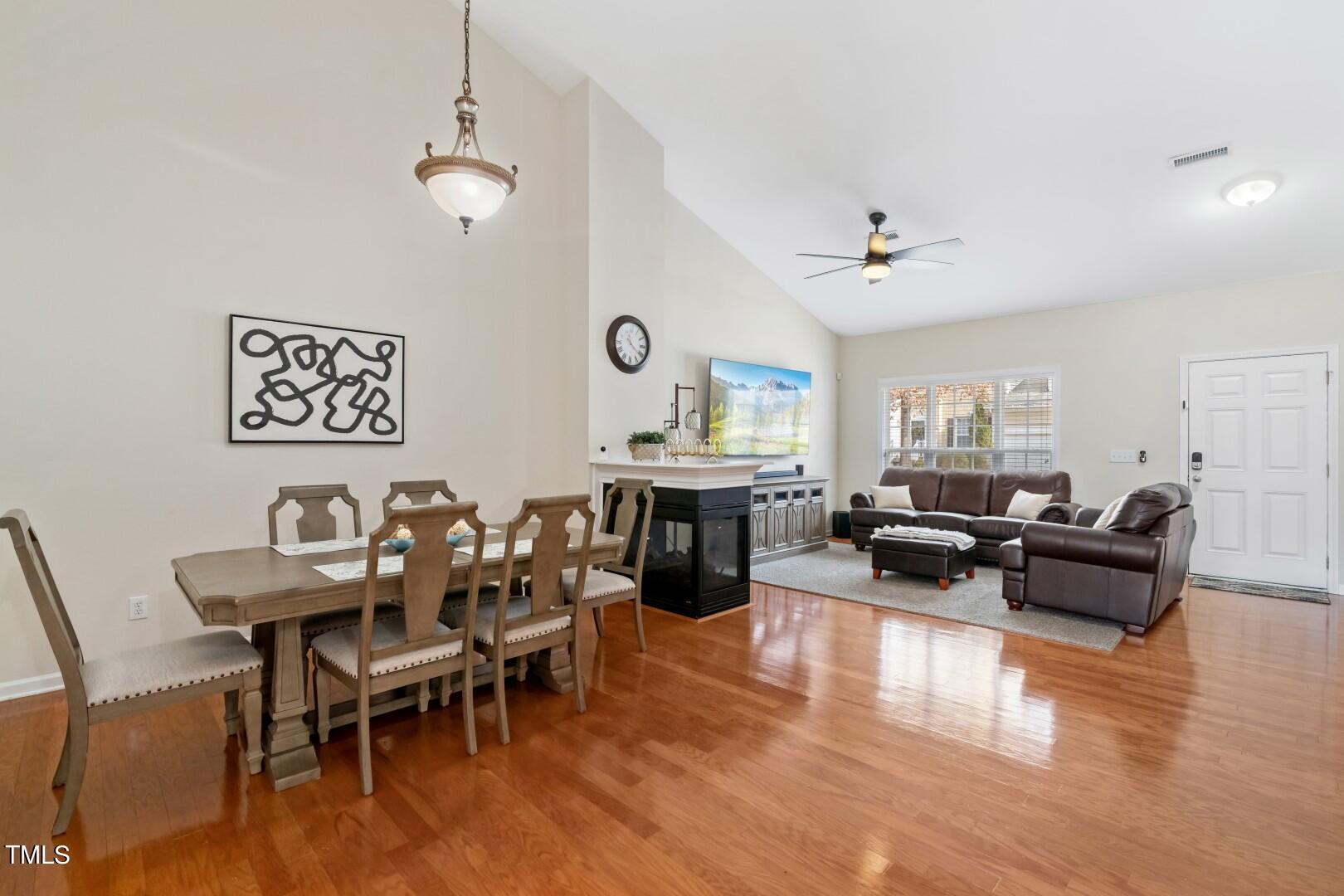12219 Fox Valley Street Raleigh, NC 27614 - Photo 6 of 36 a living room with furniture and wooden floor