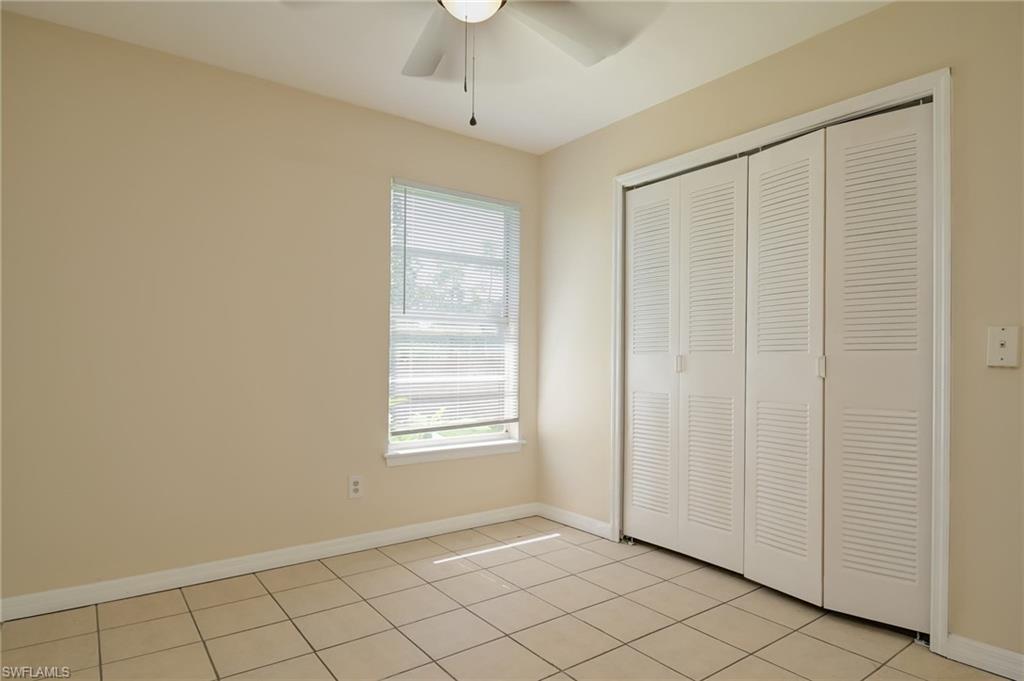 17437 Lee Road Fort Myers, FL 33967 - Photo 17 of 23 an empty room with windows
