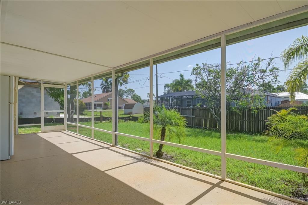 17437 Lee Road Fort Myers, FL 33967 - Photo 18 of 23 a view of a house with a backyard and a garden