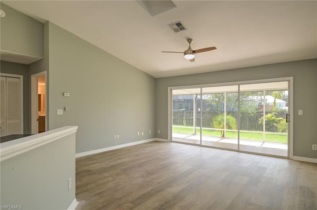 17437 Lee Road Fort Myers, FL 33967 - Photo 8 of 23 a view of an empty room with a window