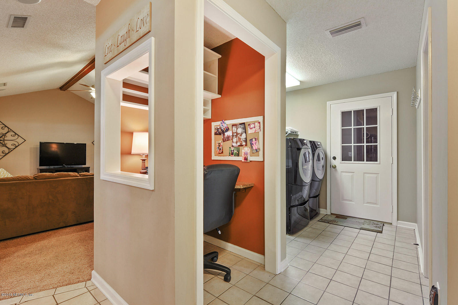 55481 Deer Run Road Callahan, FL 32011 - Photo 13 of 26 a view of a livingroom with storage space