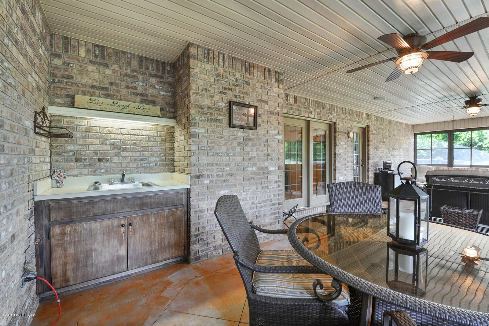 55481 Deer Run Road Callahan, FL 32011 - Photo 18 of 26 a dining room with furniture and wooden floor
