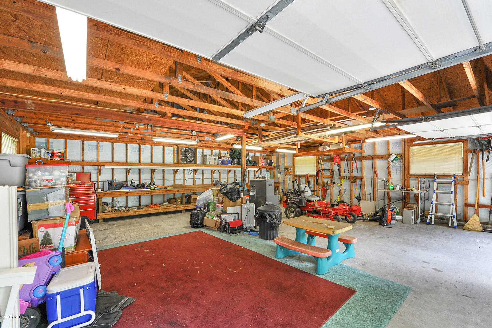 55481 Deer Run Road Callahan, FL 32011 - Photo 20 of 26 a view of a room with gym equipment