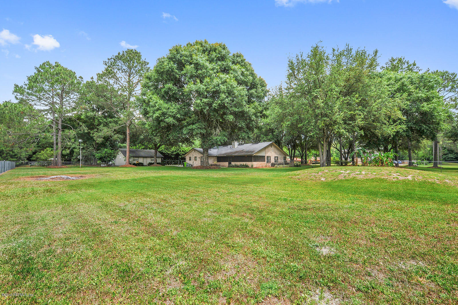 55481 Deer Run Road Callahan, FL 32011 - Photo 21 of 26 a view of a park with large trees