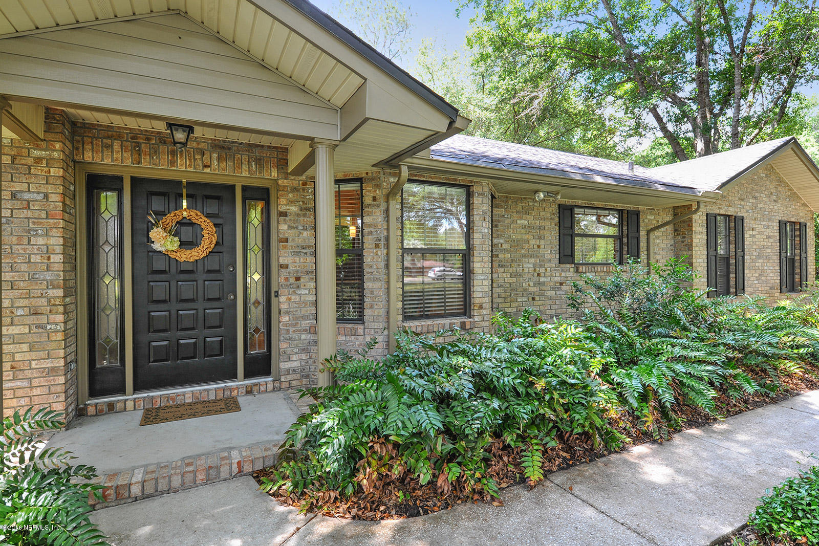 55481 Deer Run Road Callahan, FL 32011 - Photo 26 of 26 a front view of a house with a yard