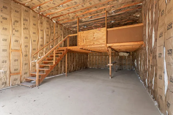 a view of a room with racks on the wall