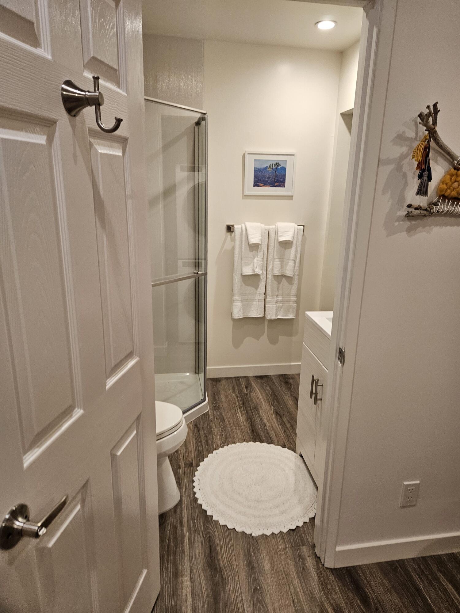 4884 Avenida Del Sol Joshua Tree, CA 92252 - Photo 13 of 18 a bathroom with a sink toilet and shower