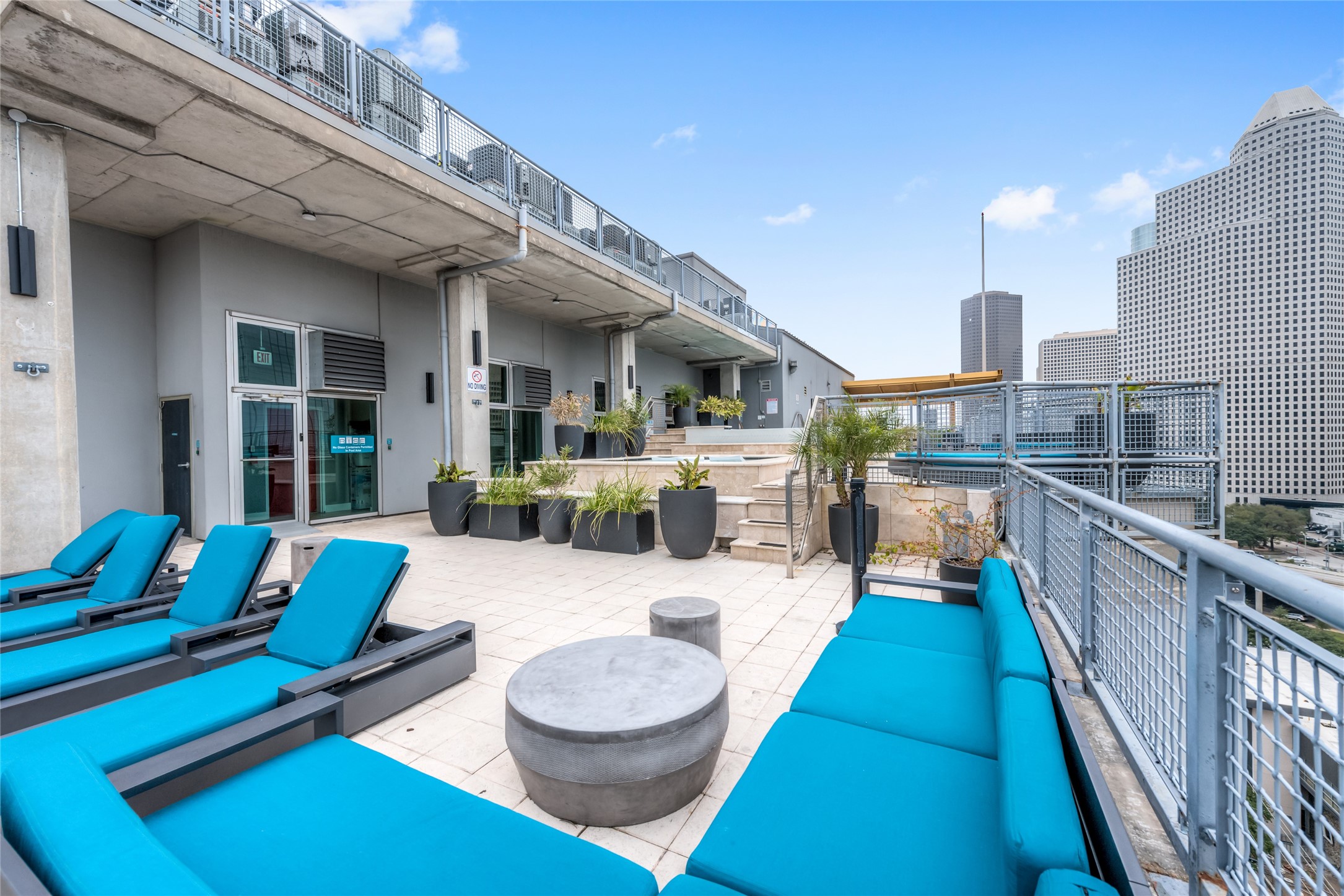 2000 Bagby Street, Unit 5400 Houston, TX 77002 - Photo 33 of 47 Relax by the pool while enjoying Downtown Skyline Views.