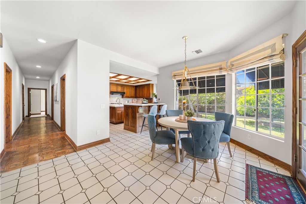 519 Connie Rae Way Arcadia, CA 91006 - Photo 16 of 71 a view of a dining room with furniture window and wooden floor