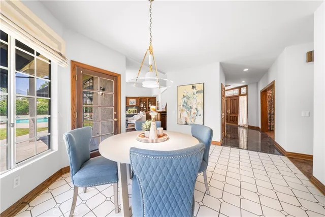 a kitchen with a sink cabinets and window