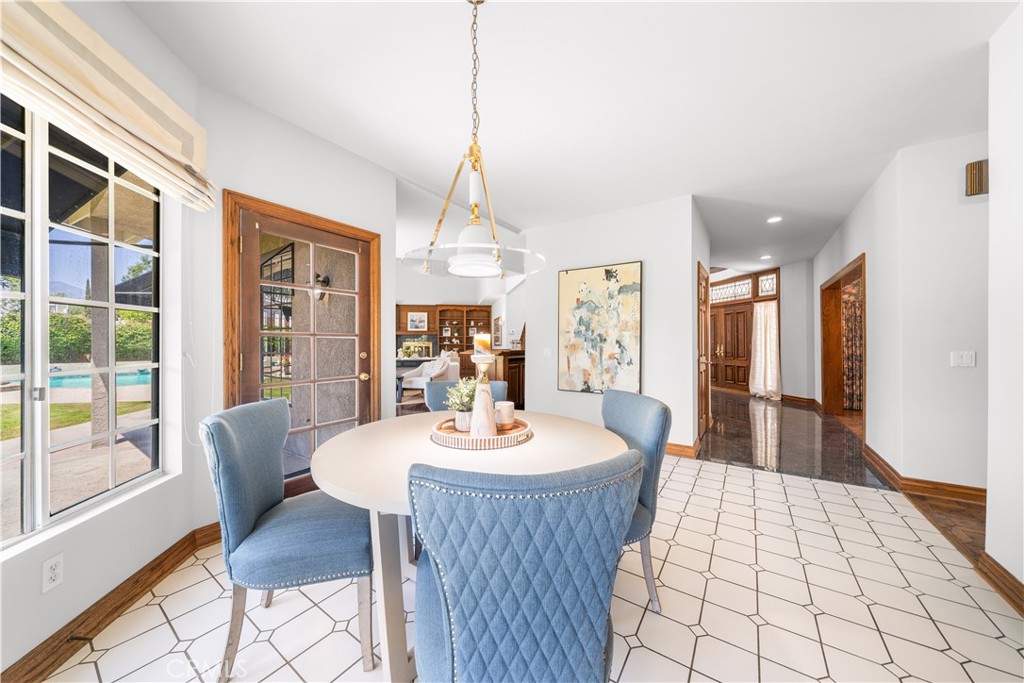 519 Connie Rae Way Arcadia, CA 91006 - Photo 17 of 71 a dining room with furniture window wooden floor and a chandelier
