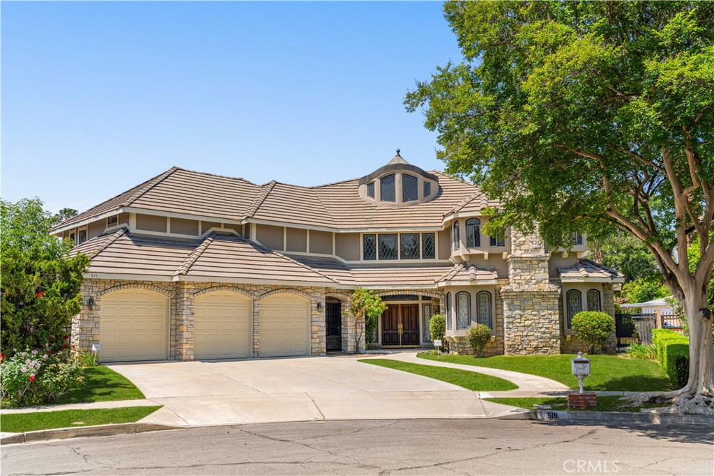 519 Connie Rae Way Arcadia, CA 91006 - Photo 2 of 71 a front view of a house with a garden