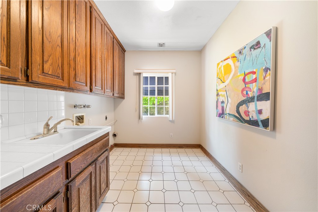 519 Connie Rae Way Arcadia, CA 91006 - Photo 22 of 71 a kitchen with a sink cabinets and window