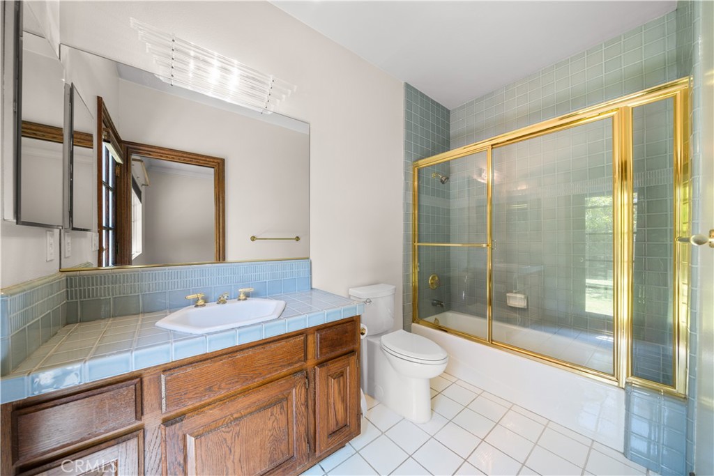 519 Connie Rae Way Arcadia, CA 91006 - Photo 25 of 71 a bathroom with a granite countertop sink toilet and shower