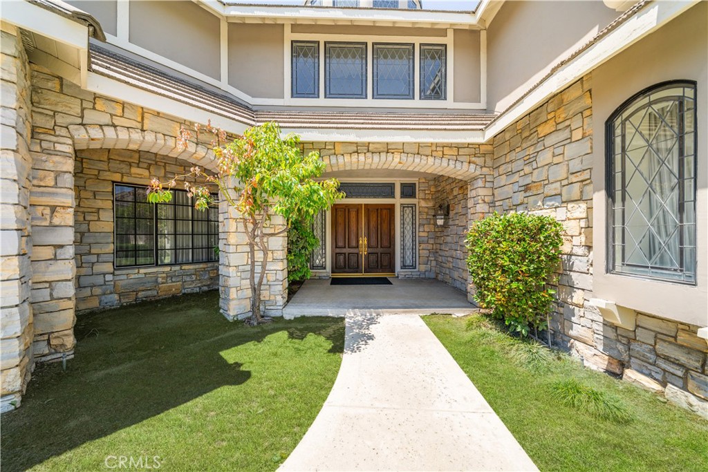 519 Connie Rae Way Arcadia, CA 91006 - Photo 3 of 71 a front view of a house with garden