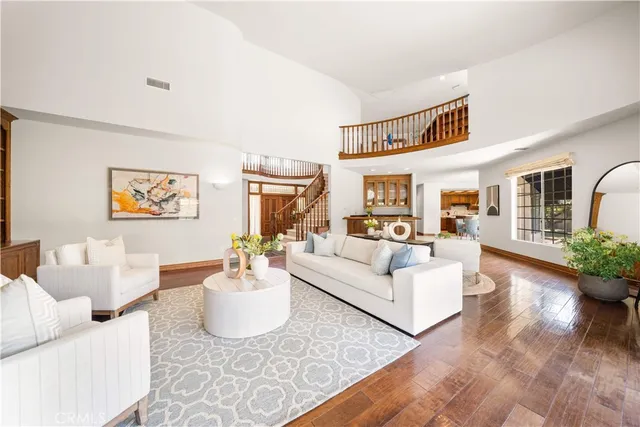 a view of a backyard with wooden fence