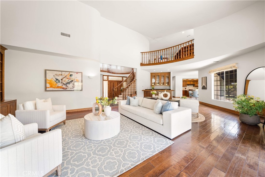 519 Connie Rae Way Arcadia, CA 91006 - Photo 31 of 71 a living room with furniture potted plant and kitchen view