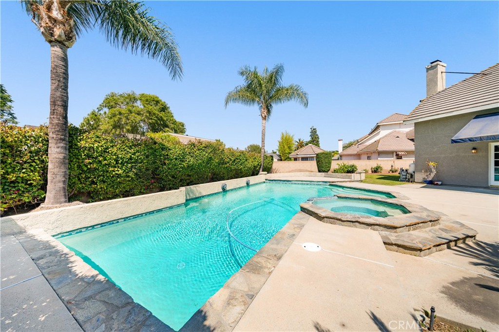 519 Connie Rae Way Arcadia, CA 91006 - Photo 36 of 71 a view of a backyard with plants and palm tree