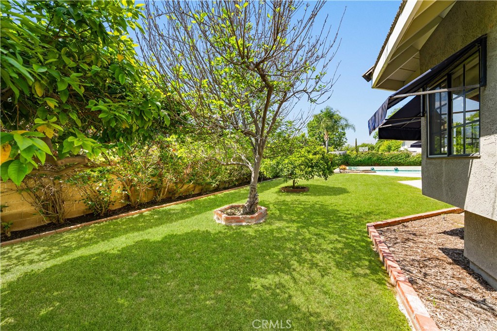 519 Connie Rae Way Arcadia, CA 91006 - Photo 40 of 71 a view of a backyard with wooden fence