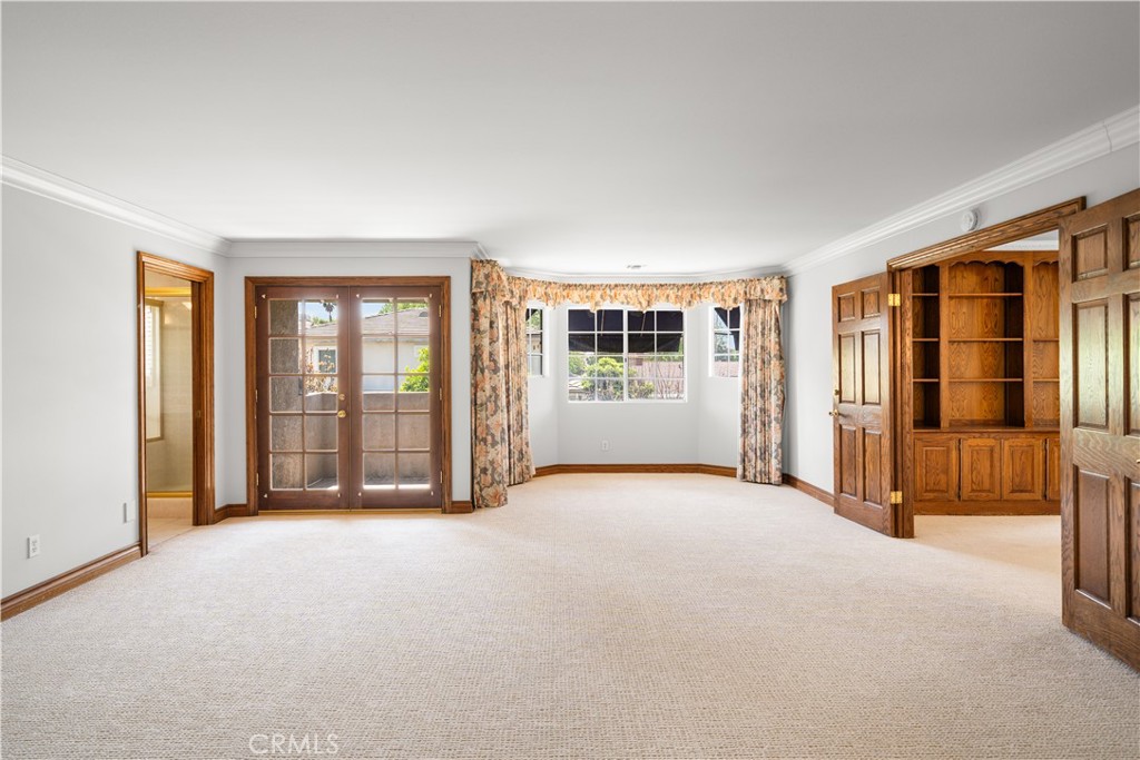 519 Connie Rae Way Arcadia, CA 91006 - Photo 56 of 71 an empty room with furniture and floor to ceiling window