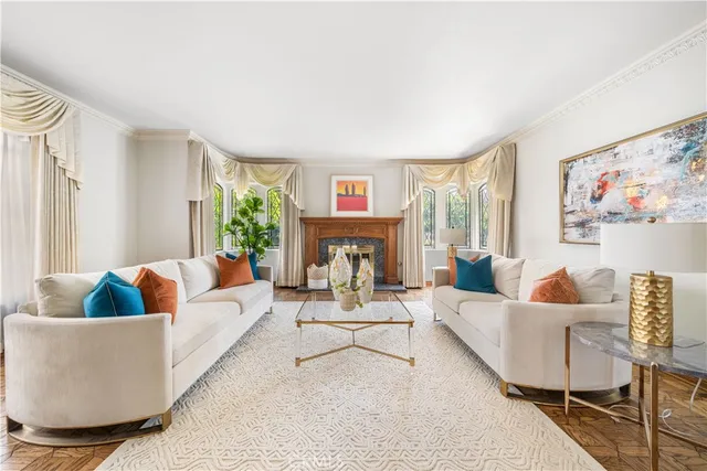 a bathroom with a granite countertop toilet a sink and a mirror