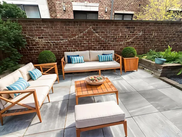 a view of a patio with couches chairs and a fire pit