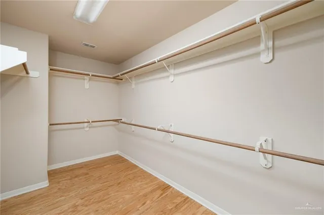 a view of a room with racks on the wall