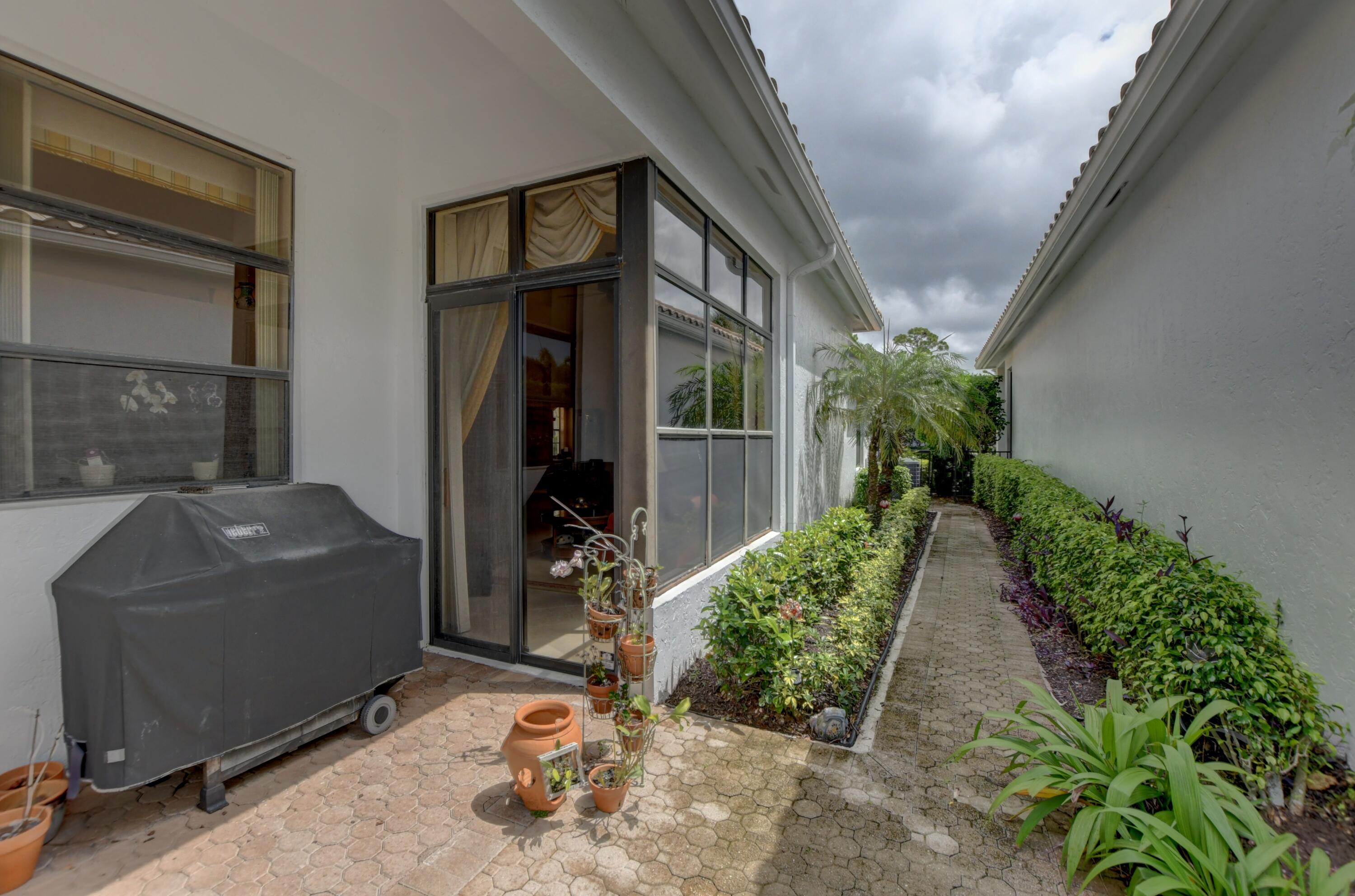 2424 Northwest 63rd Street Boca Raton, FL 33496 - Photo 33 of 35 Side yard