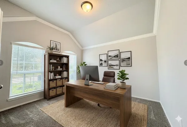 a living room with furniture and a window