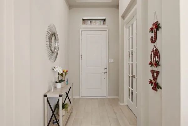 an entryway with a workspace