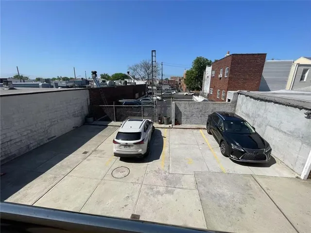 a car parked on the side of a building
