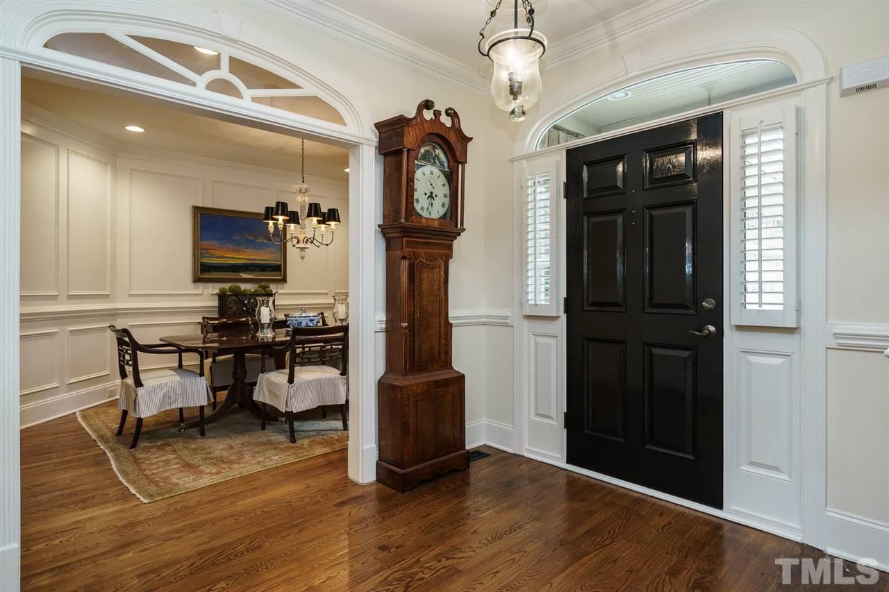 1820 Torrington Street Raleigh, NC 27615 - Photo 2 of 25 a view of dining room with wooden floor and white cabinet