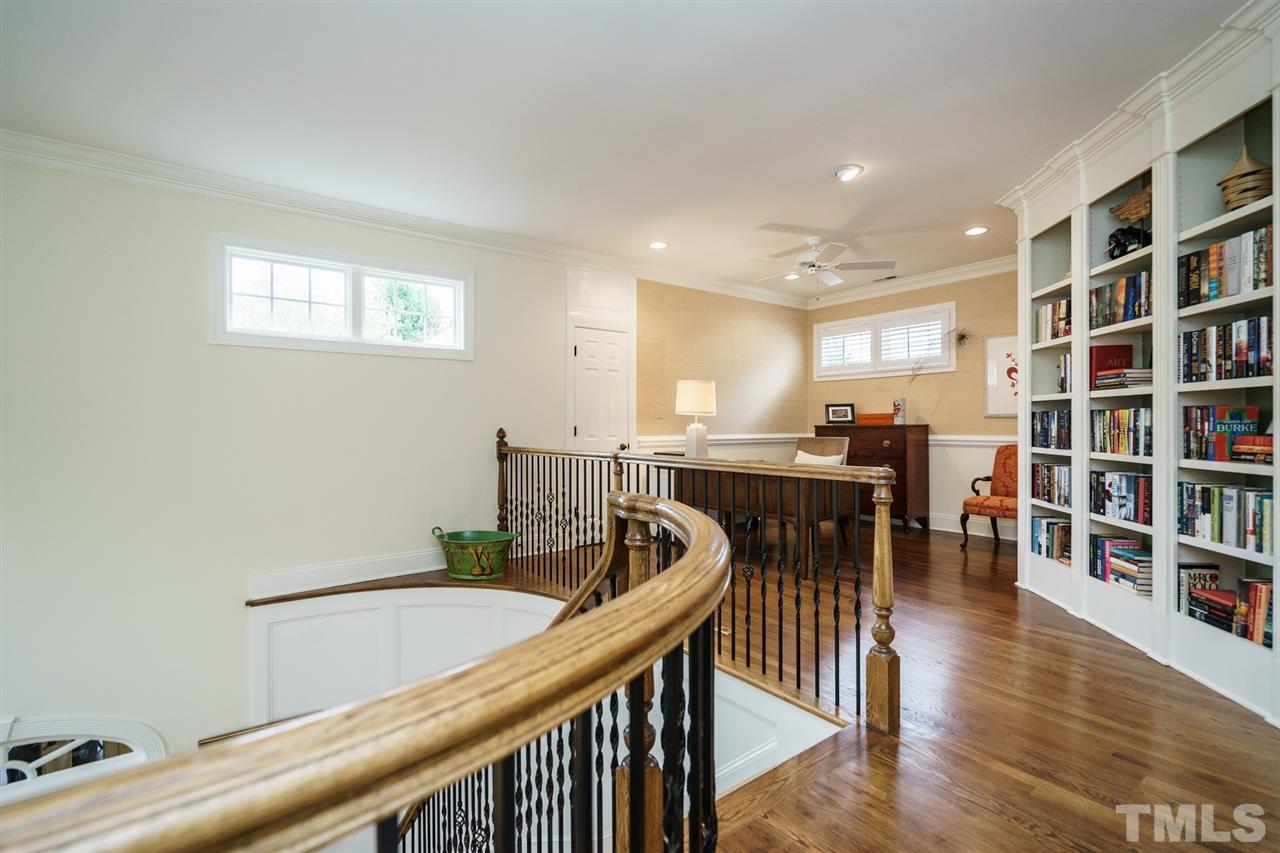 1820 Torrington Street Raleigh, NC 27615 - Photo 19 of 25 a view of a dining room with furniture and wooden floor